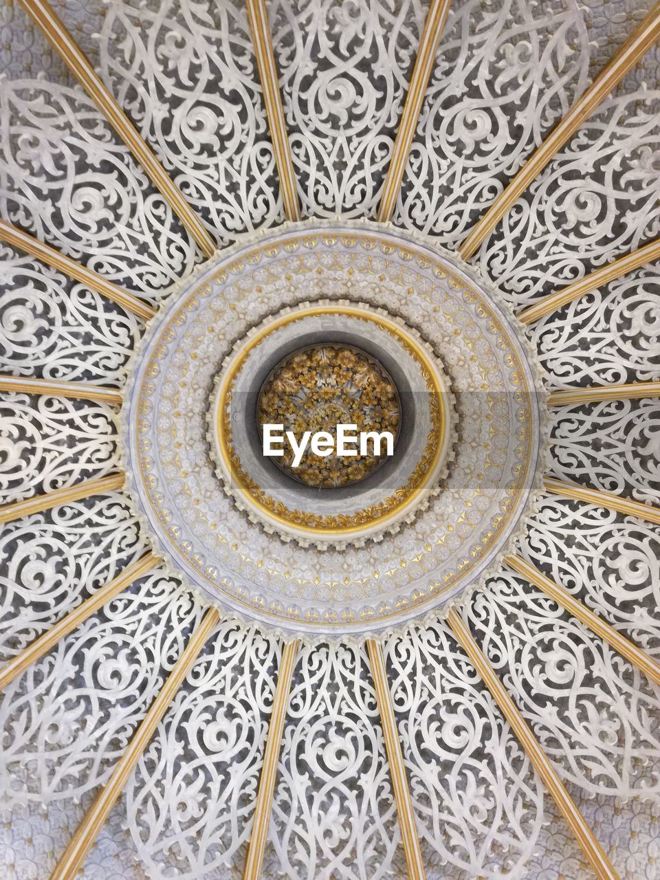 LOW ANGLE VIEW OF ORNATE CEILING