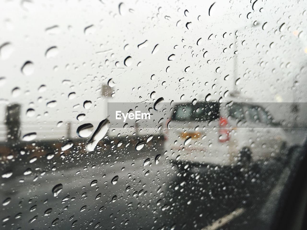 VIEW OF RAIN DROPS ON GLASS