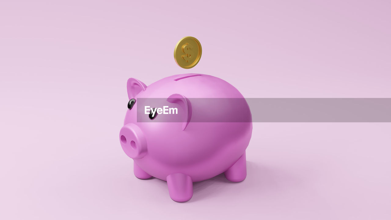 CLOSE-UP OF PINK TOY AGAINST WHITE BACKGROUND