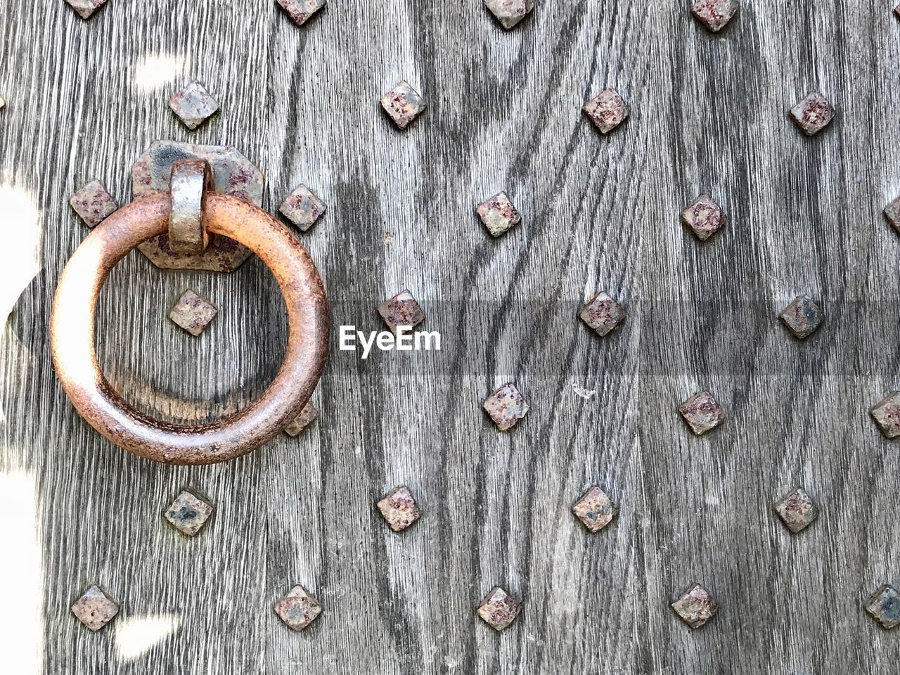 FULL FRAME SHOT OF METAL DOOR WITH KNOCKER