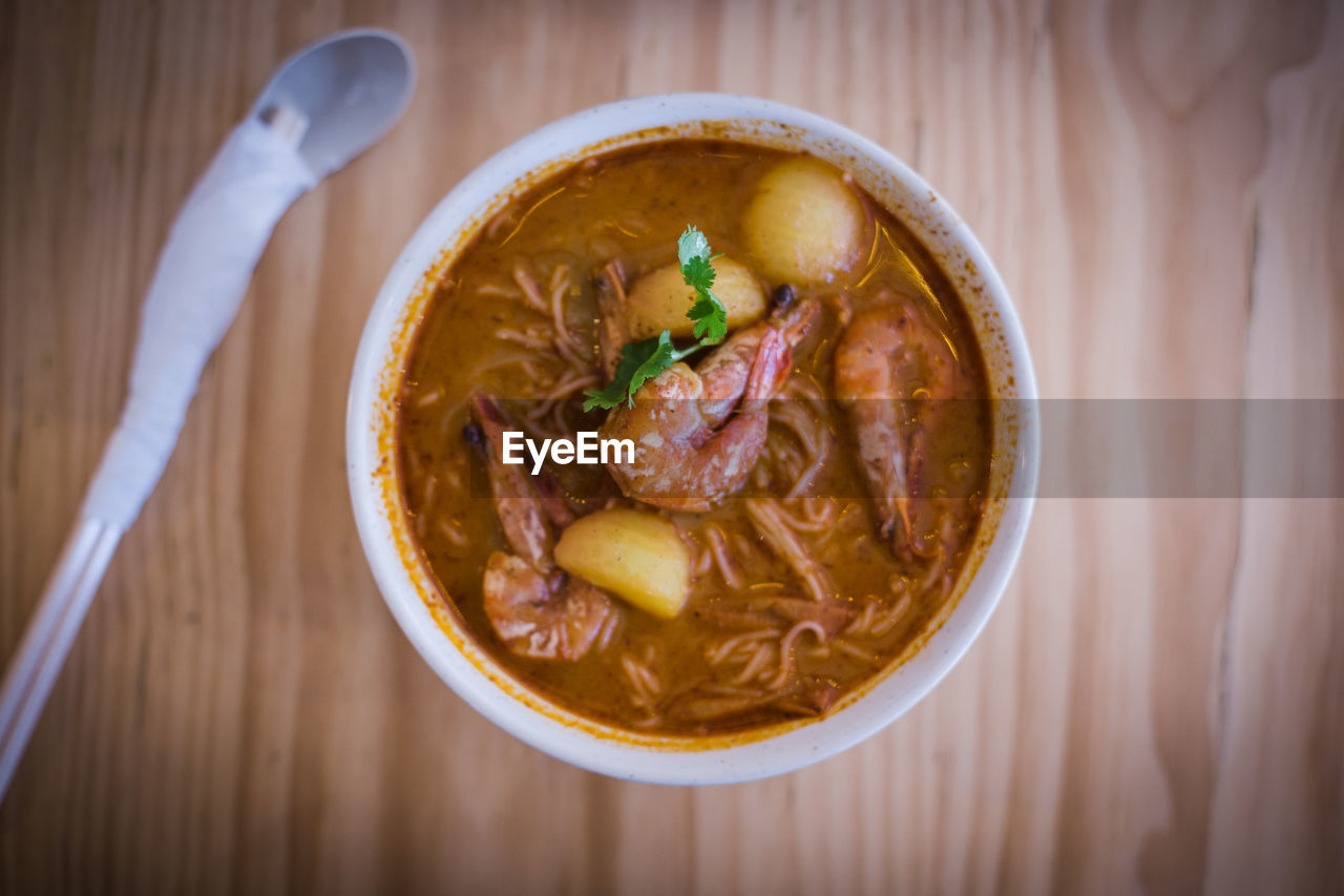 Directly above shot of soup in bowl on table