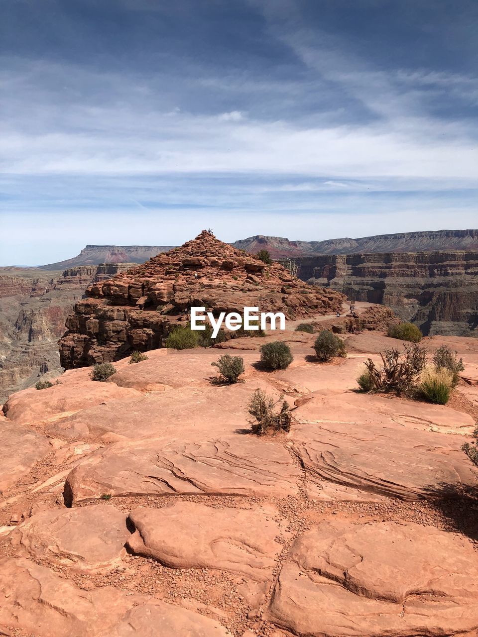 Scenic view of desert landscape against sky