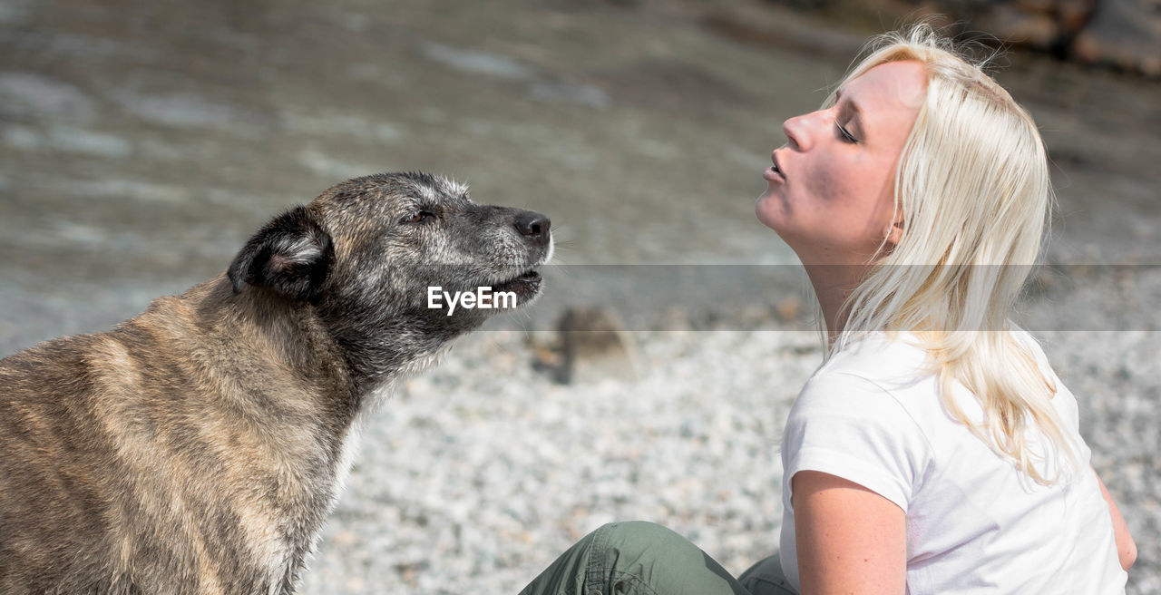 Close-up of woman with dog