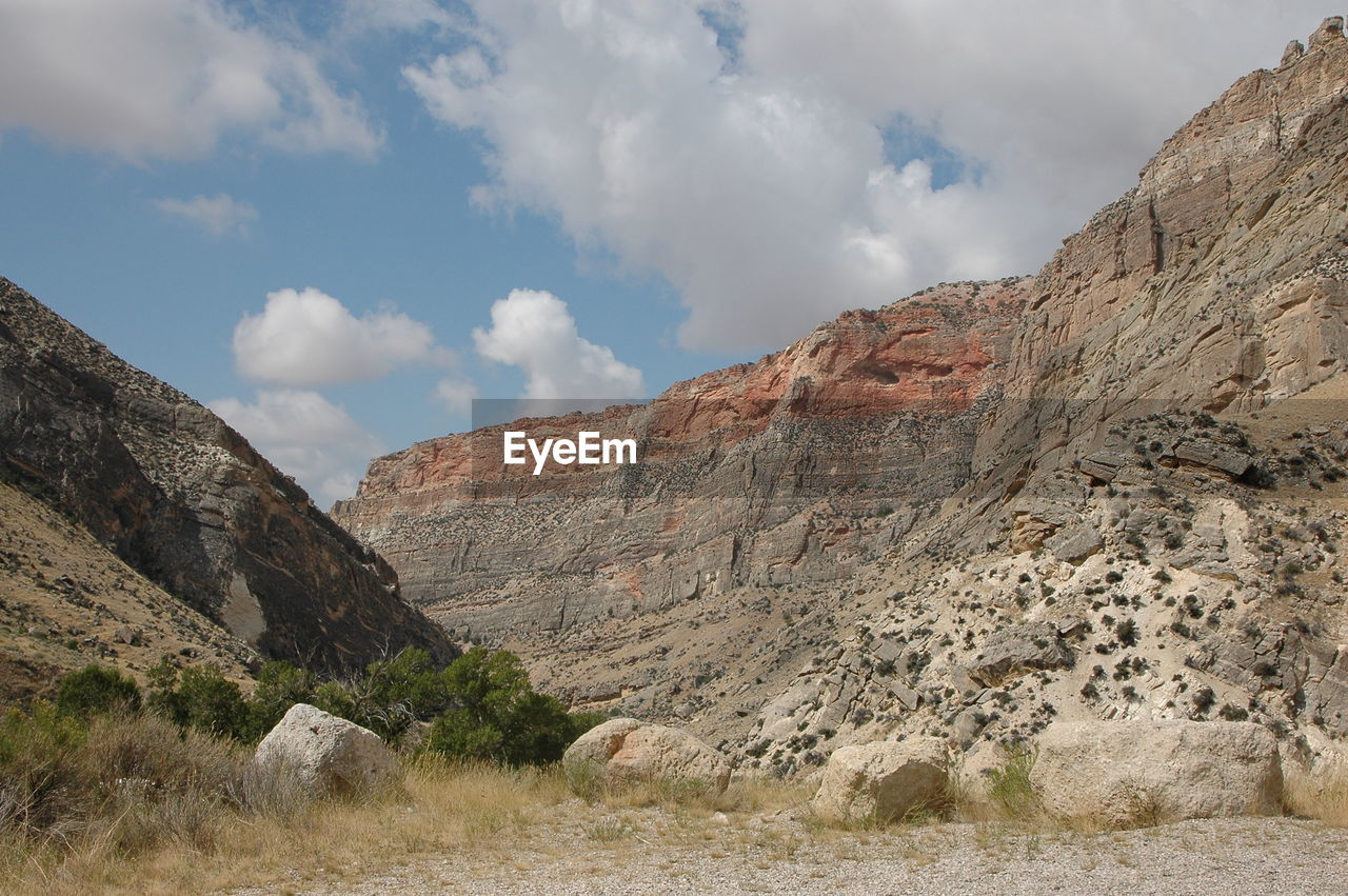 Scenic view of rocky mountains against sky