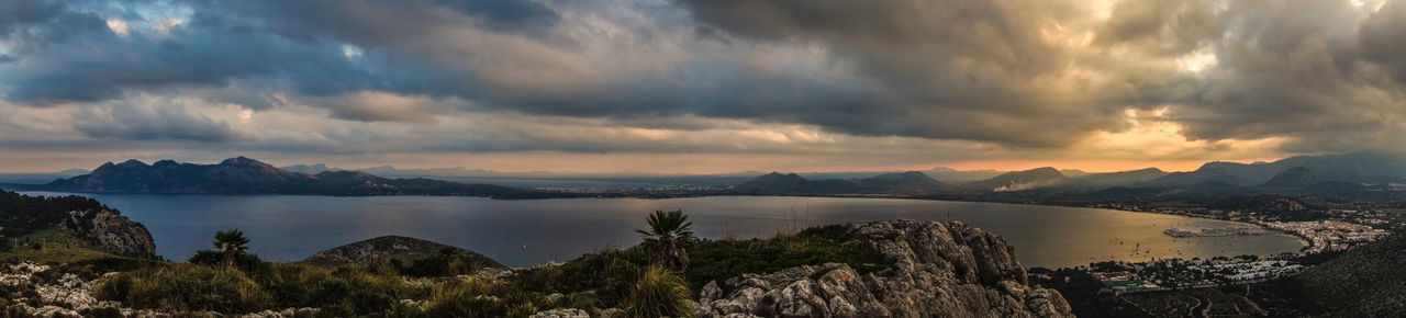 Panoramic view of sea against sky during sunset