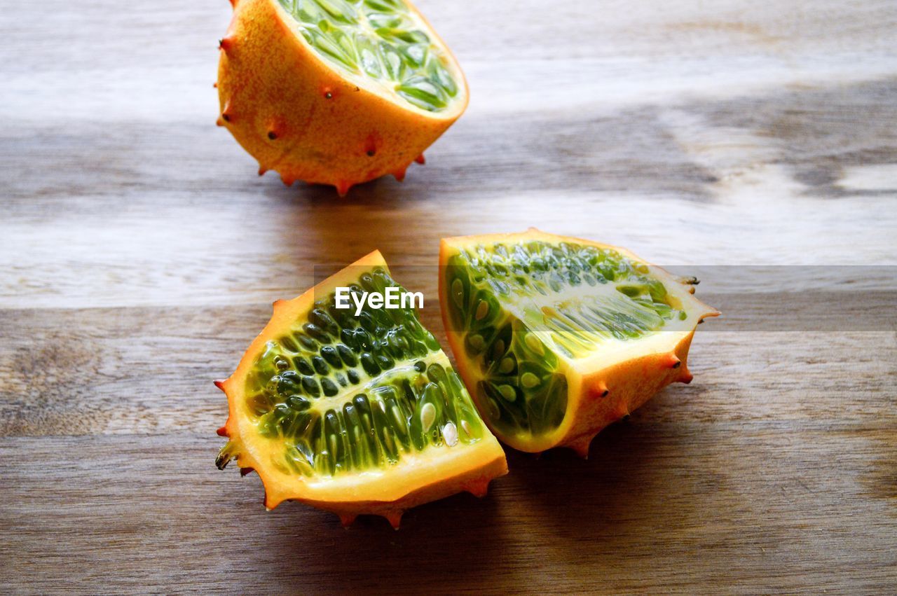 CLOSE-UP OF FRUIT ON TABLE