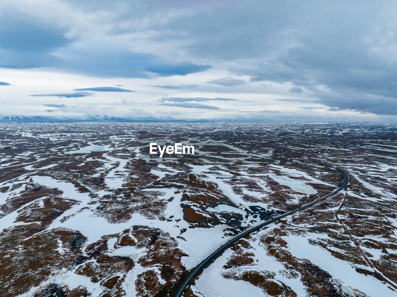 Aerial video of an empty lava fields and huge volcanic mountain in iceland