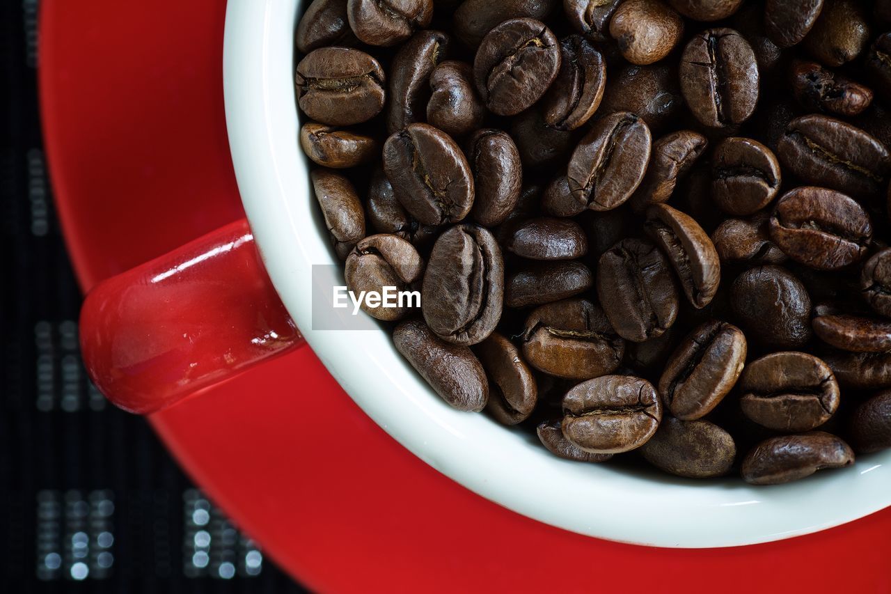 Close-up of coffee beans in cup