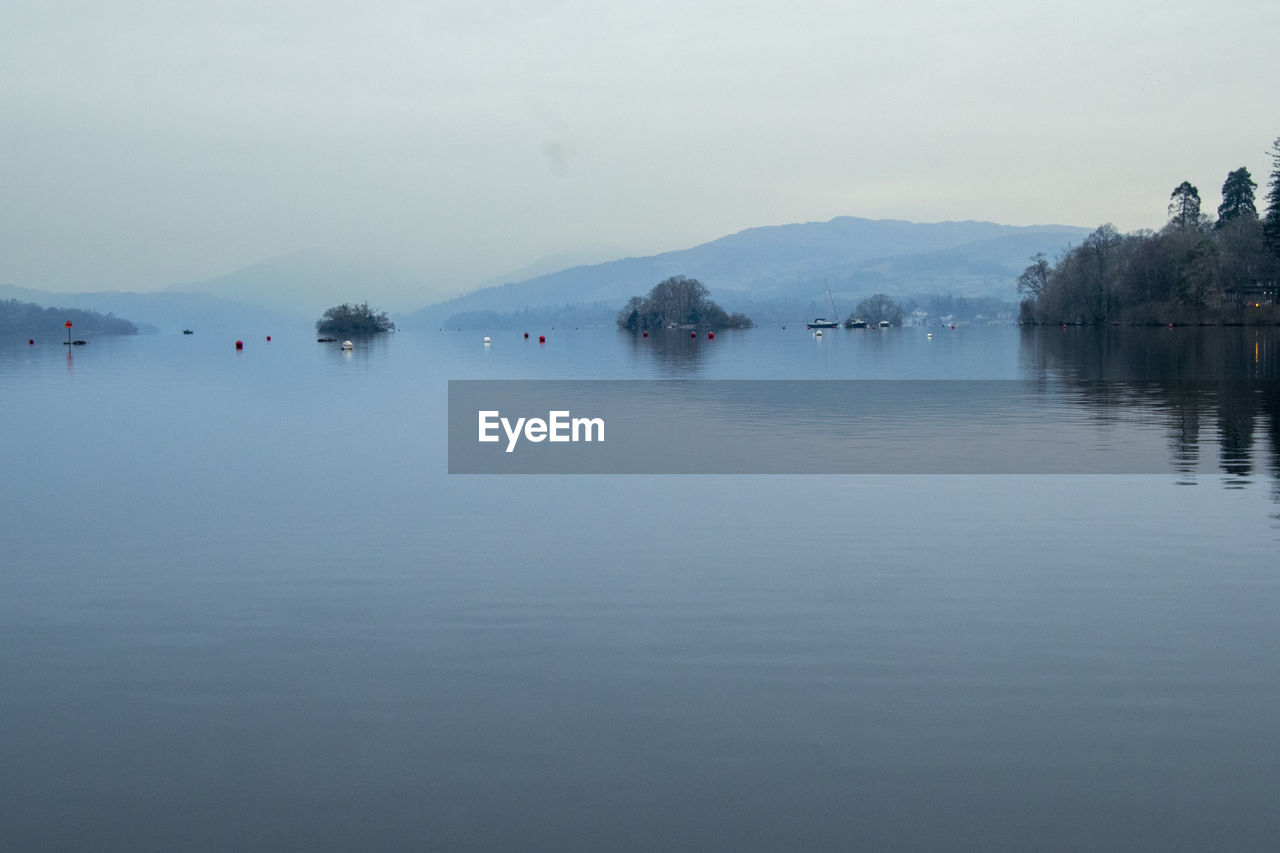 Scenic view of lake against clear sky