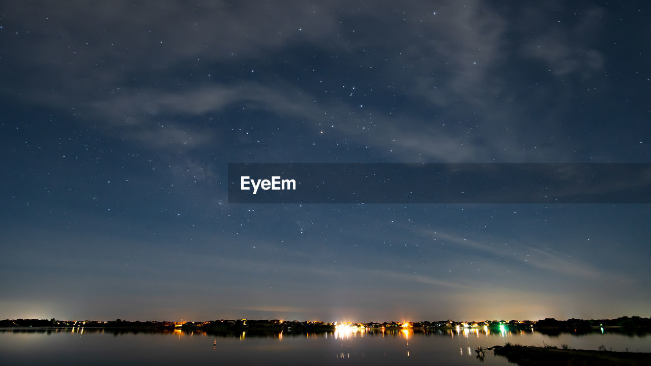 Scenic view of illuminated sky at night