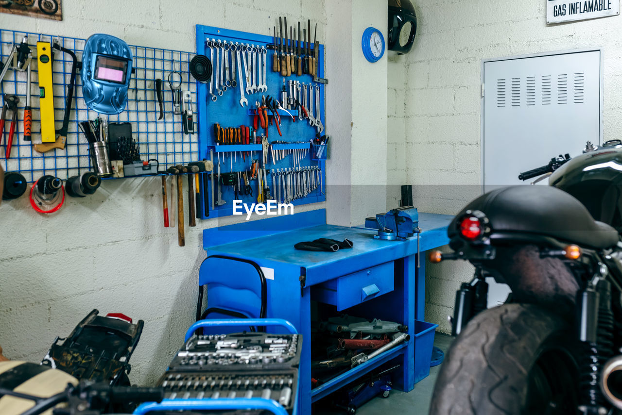 Various work tools hanging in workshop