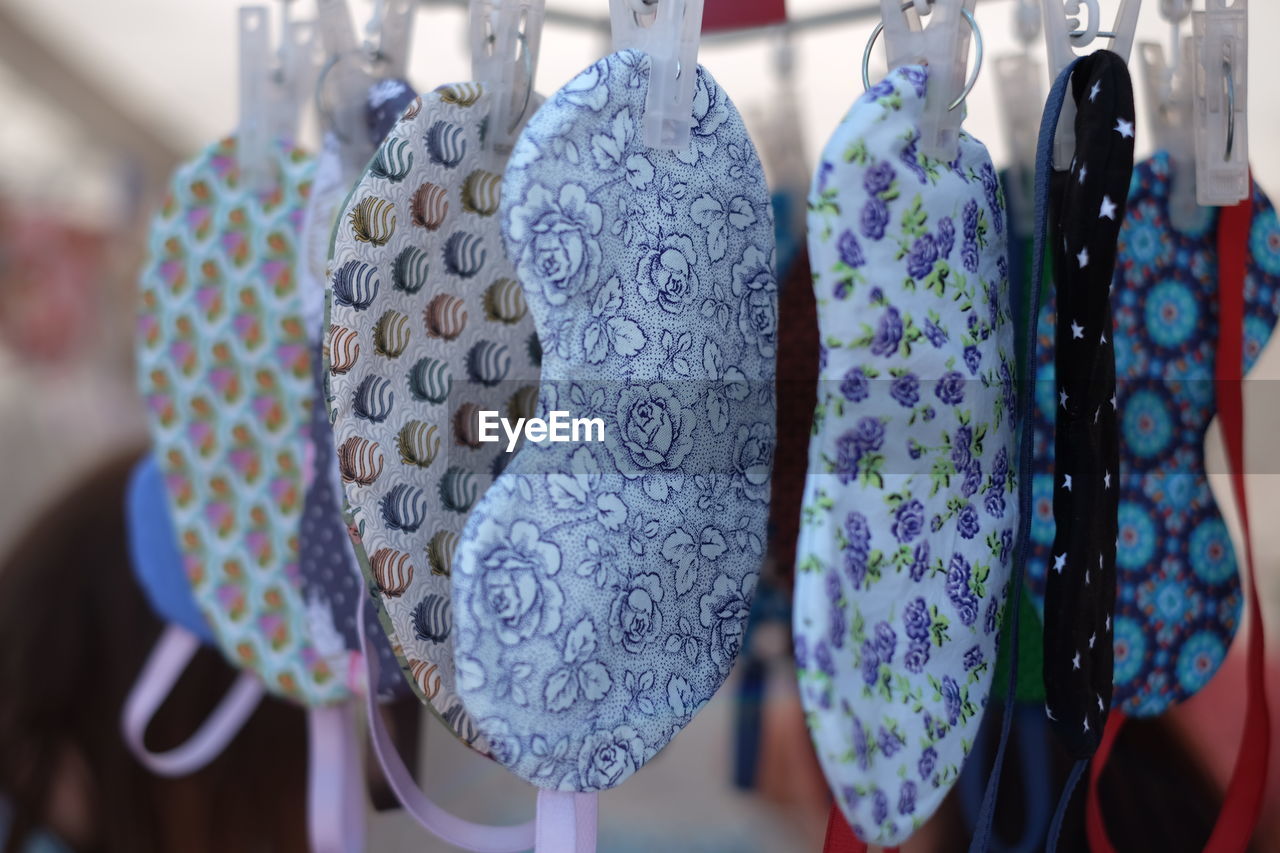 Close-up of patterned sleep masks for sale in market