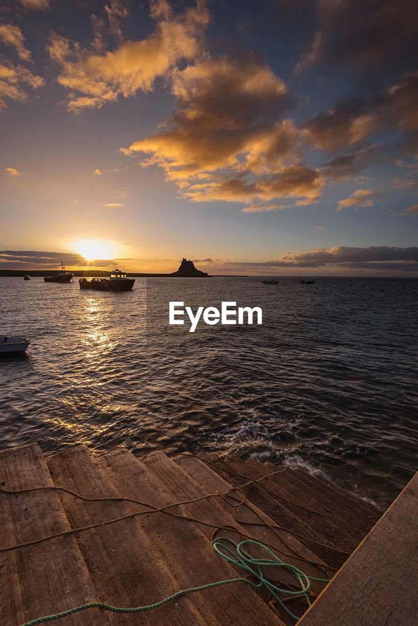 Scenic view of sea during sunset