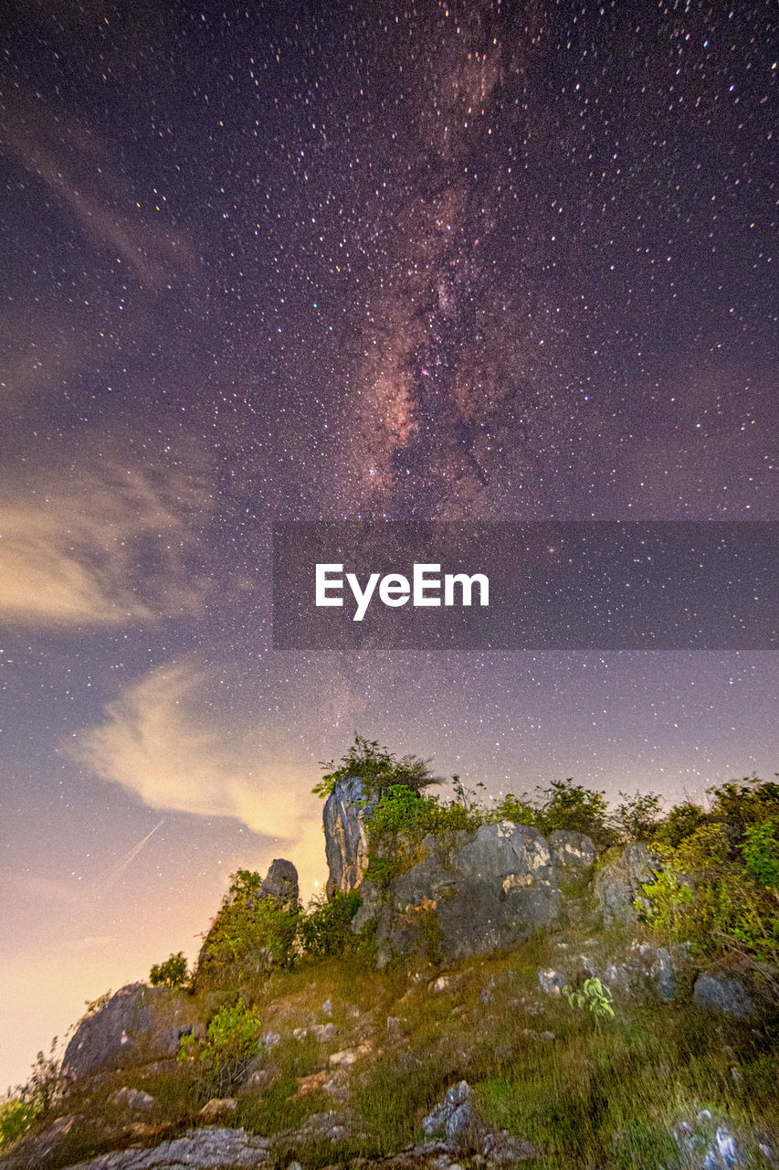 Scenic view of star field against sky at night