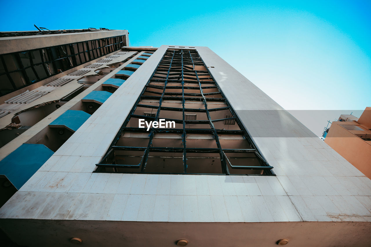 Low angle view of modern building against clear sky