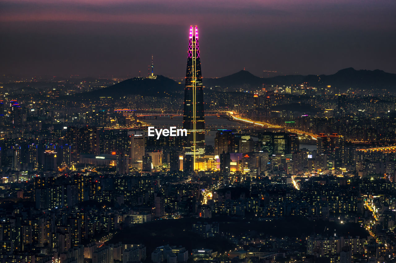 High angle view of illuminated city at night