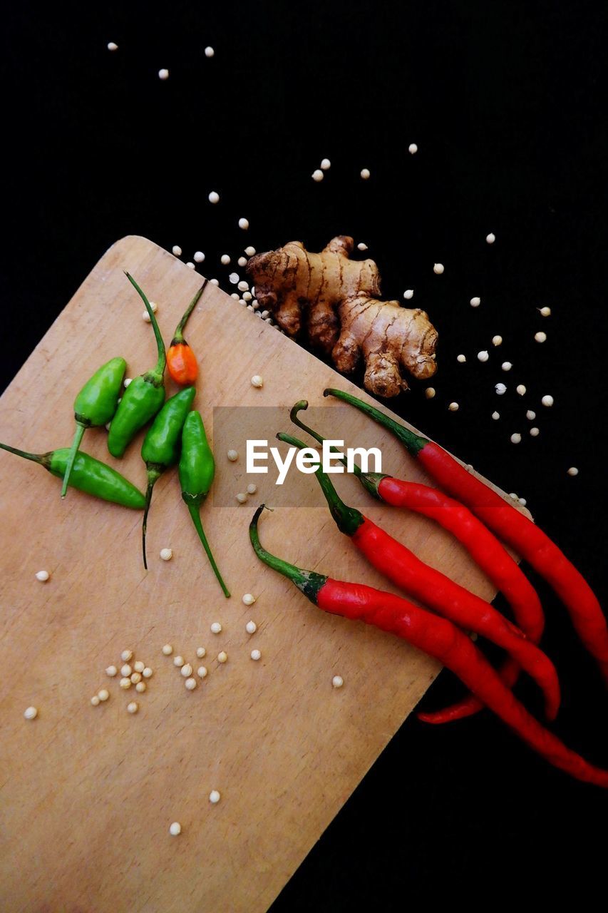 High angle view of chili peppers on table