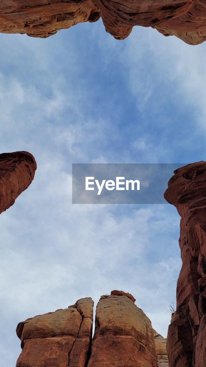 rock, arch, sky, nature, rock formation, low angle view, cloud, day, travel destinations, temple, outdoors, travel, formation, no people, beauty in nature, scenics - nature, adventure, geology, tranquility, non-urban scene