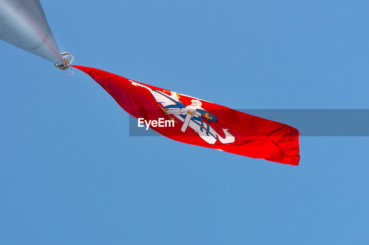 LOW ANGLE VIEW OF FLAG AGAINST SKY