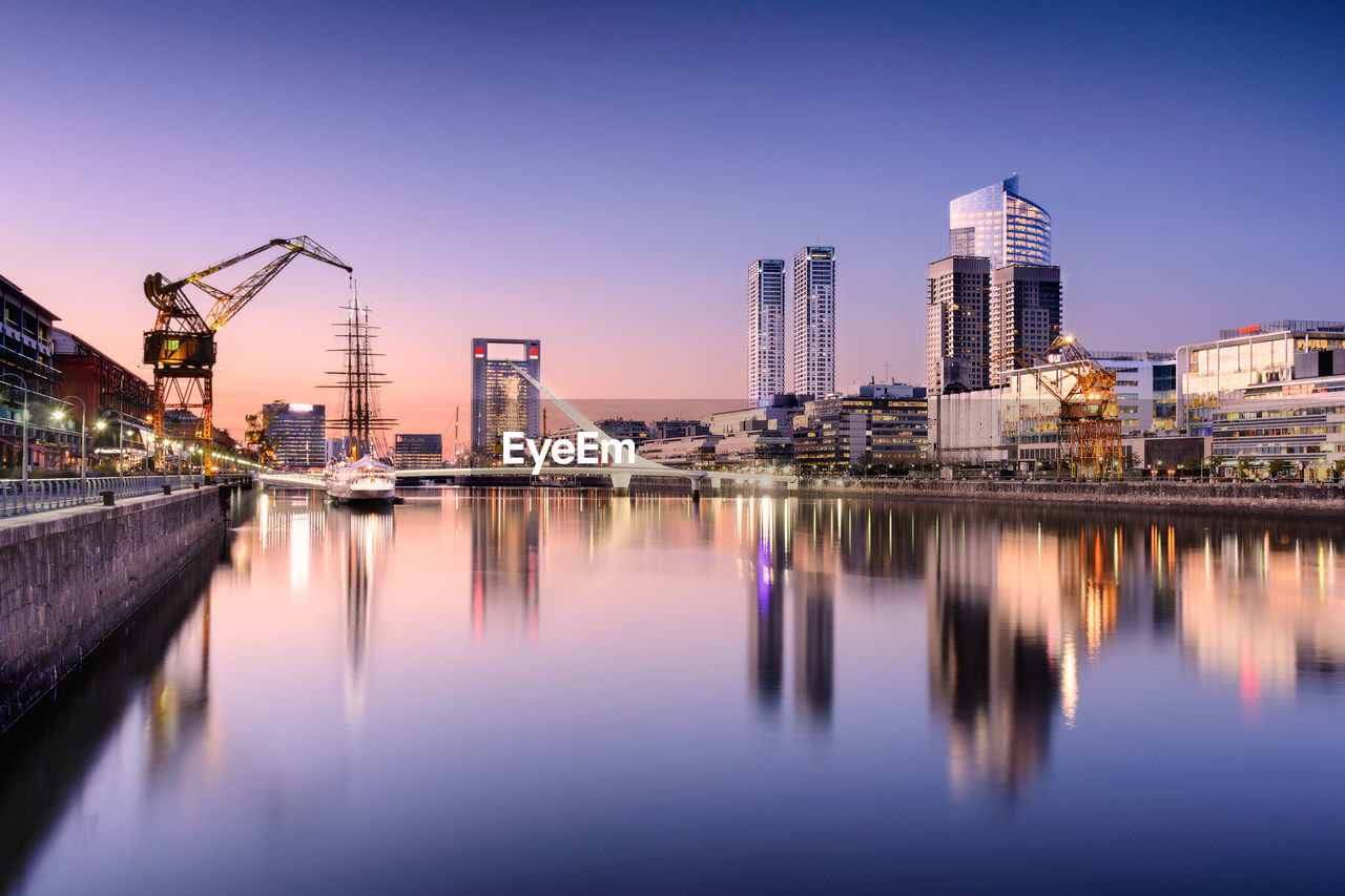 View of puerto madero against clear sky at dusk