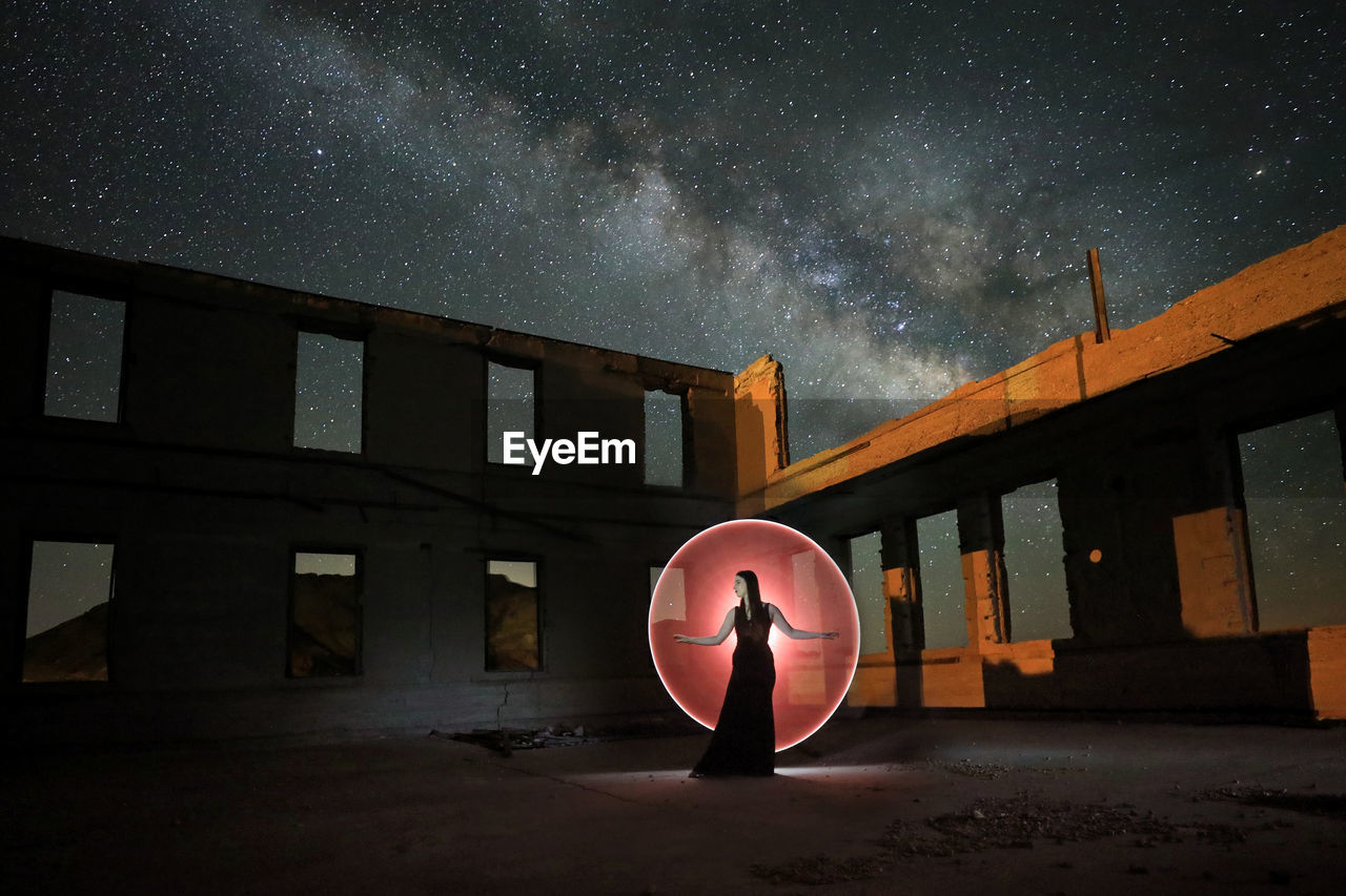 DIGITAL COMPOSITE IMAGE OF BUILDINGS AGAINST SKY