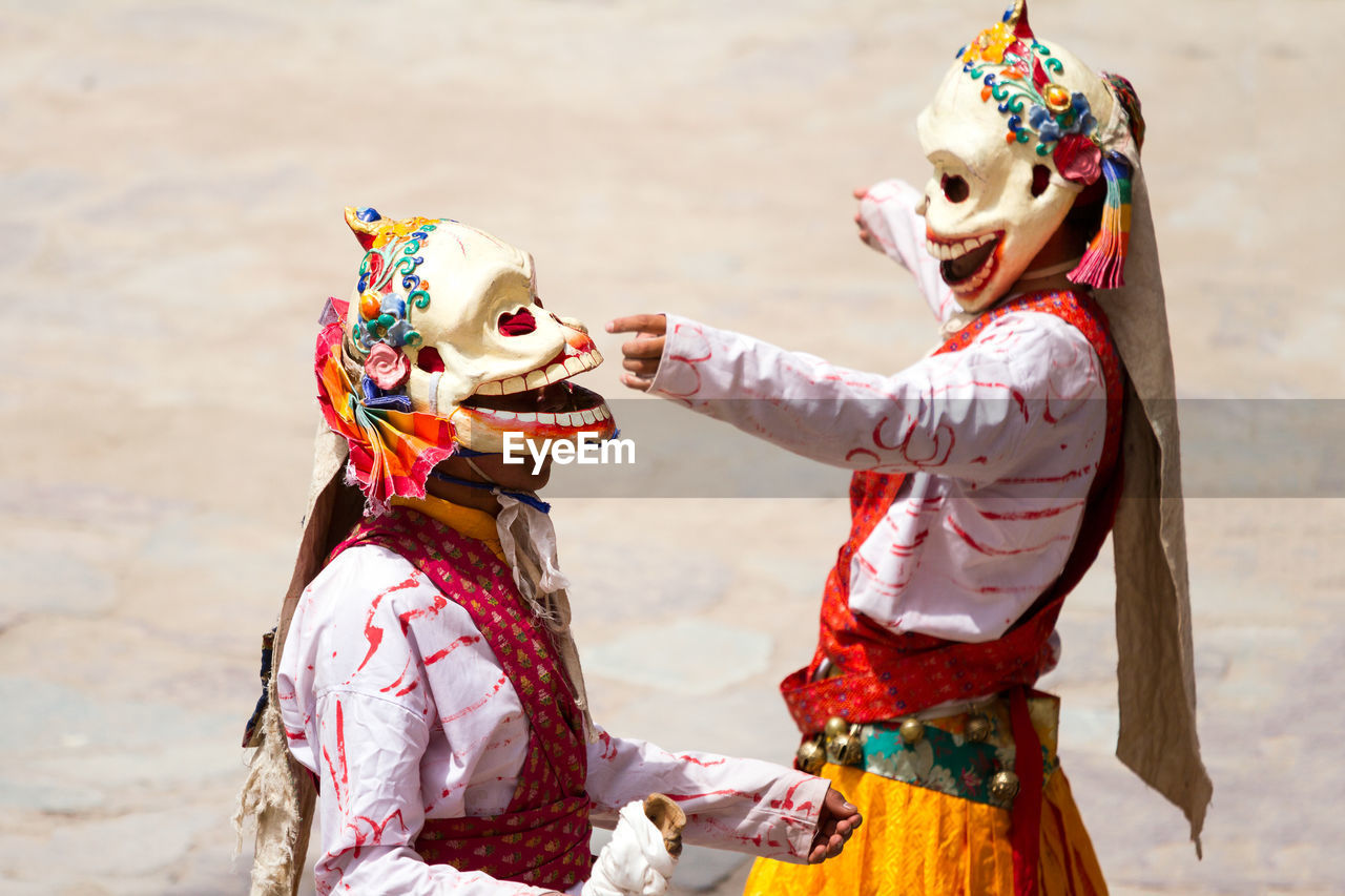 GIRL AND WOMAN WITH MASK