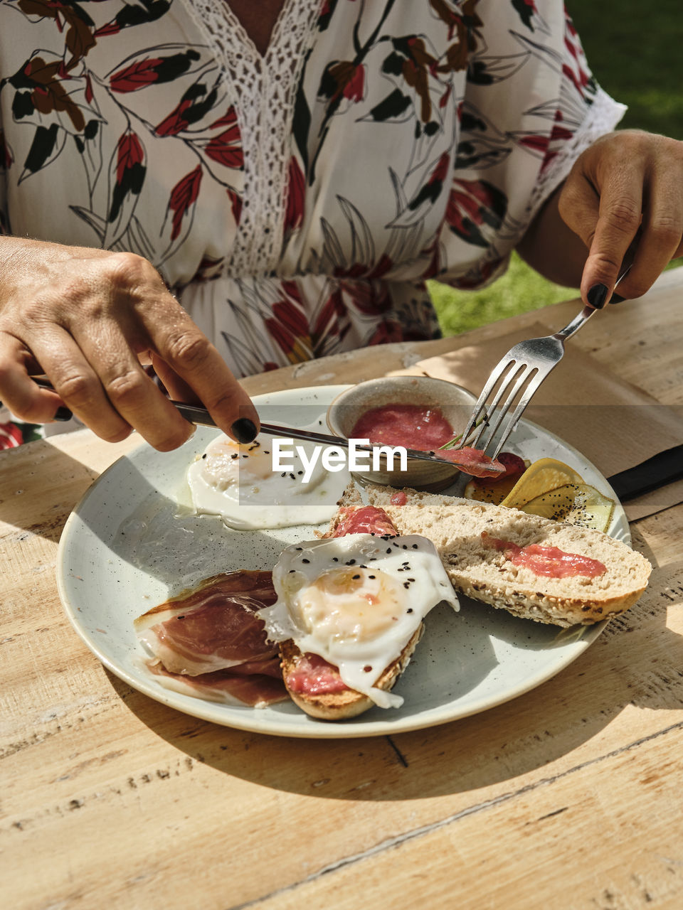 Midsection of person preparing food on table