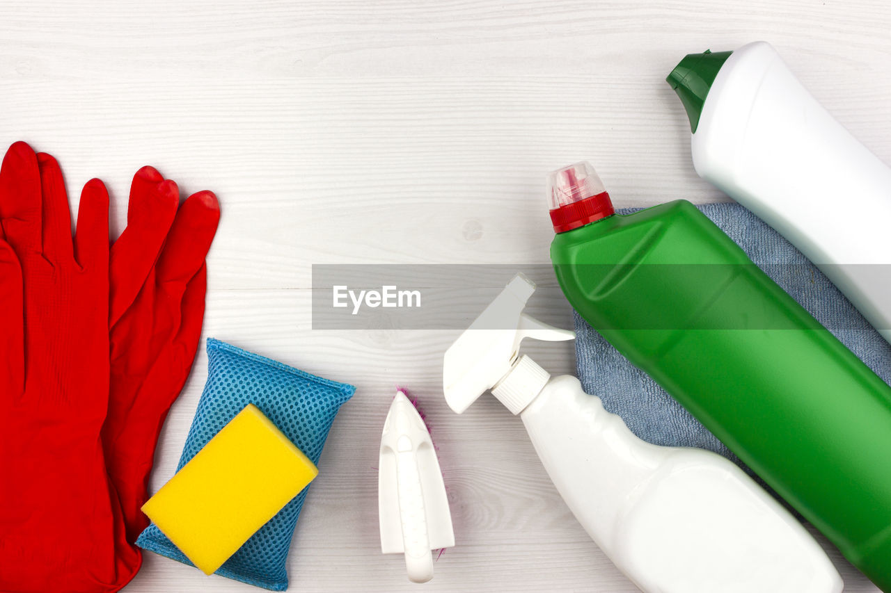 Cleaning tools. set of cleaning supplies - spray and cleaning agent, gloves, brush and sponge.