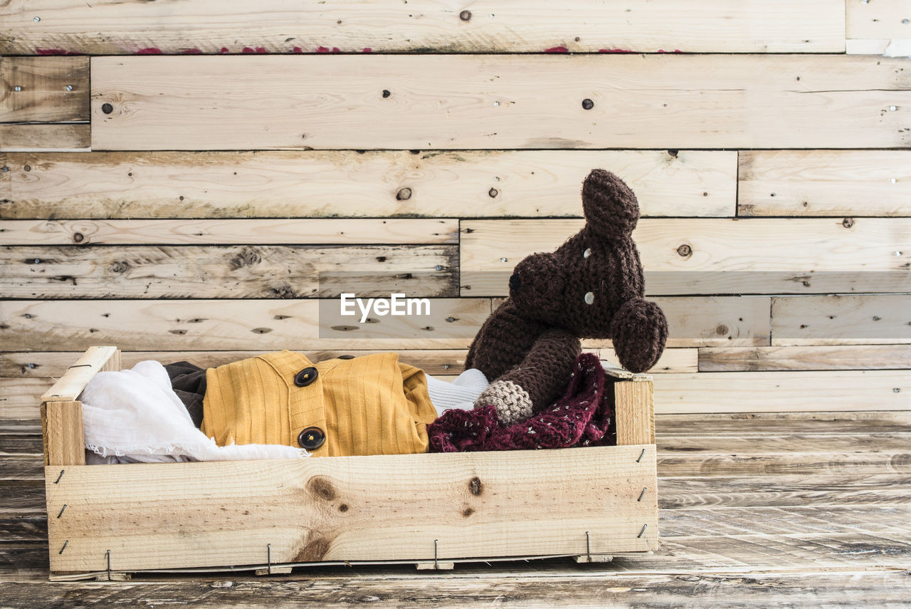 Woman working on wooden bench