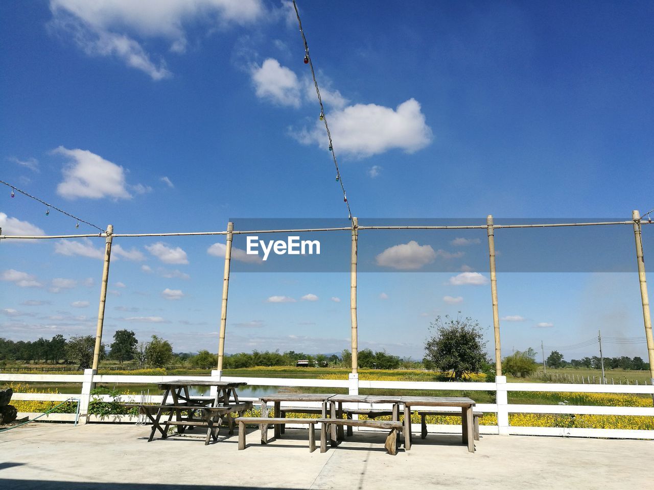 EMPTY SEATS AGAINST BLUE SKY