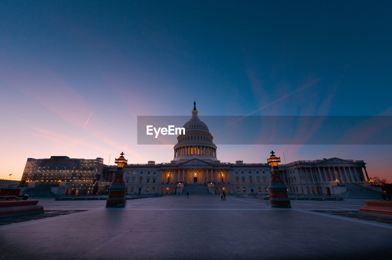 Historic building against sky at dusk