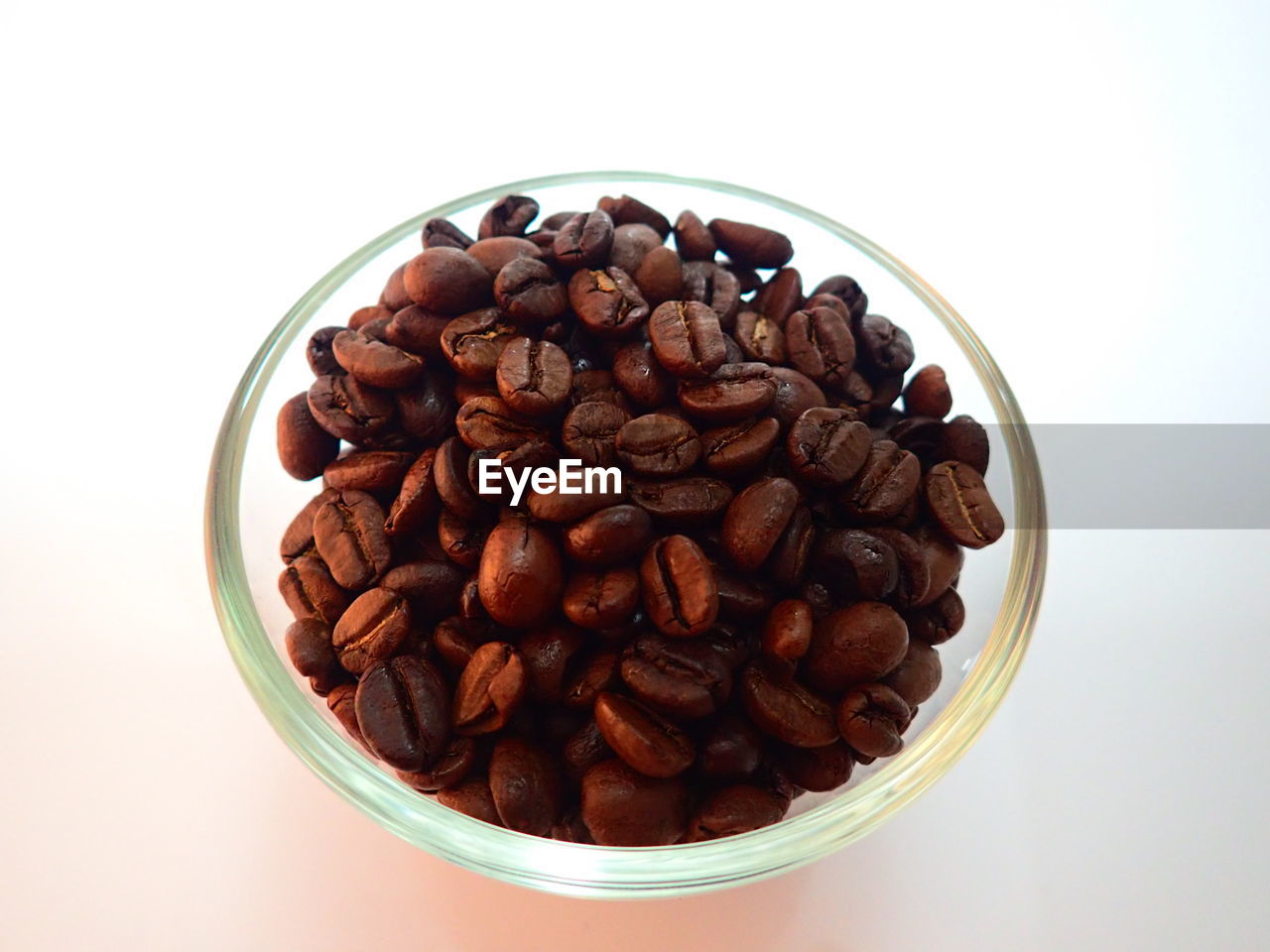 Directly above shot of coffee beans in container