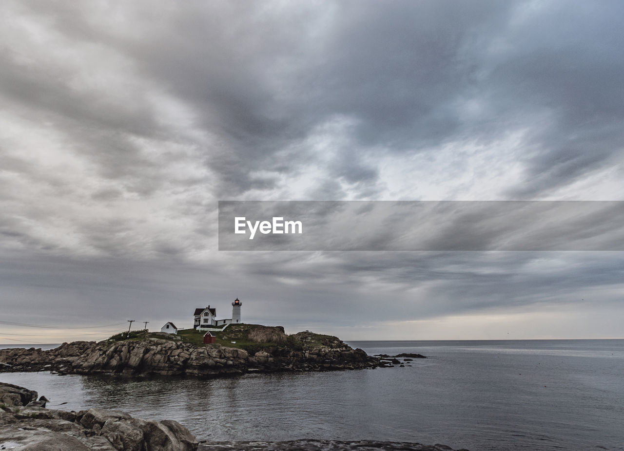 Moody cloudy stormy gray day at nubble light, york, maine