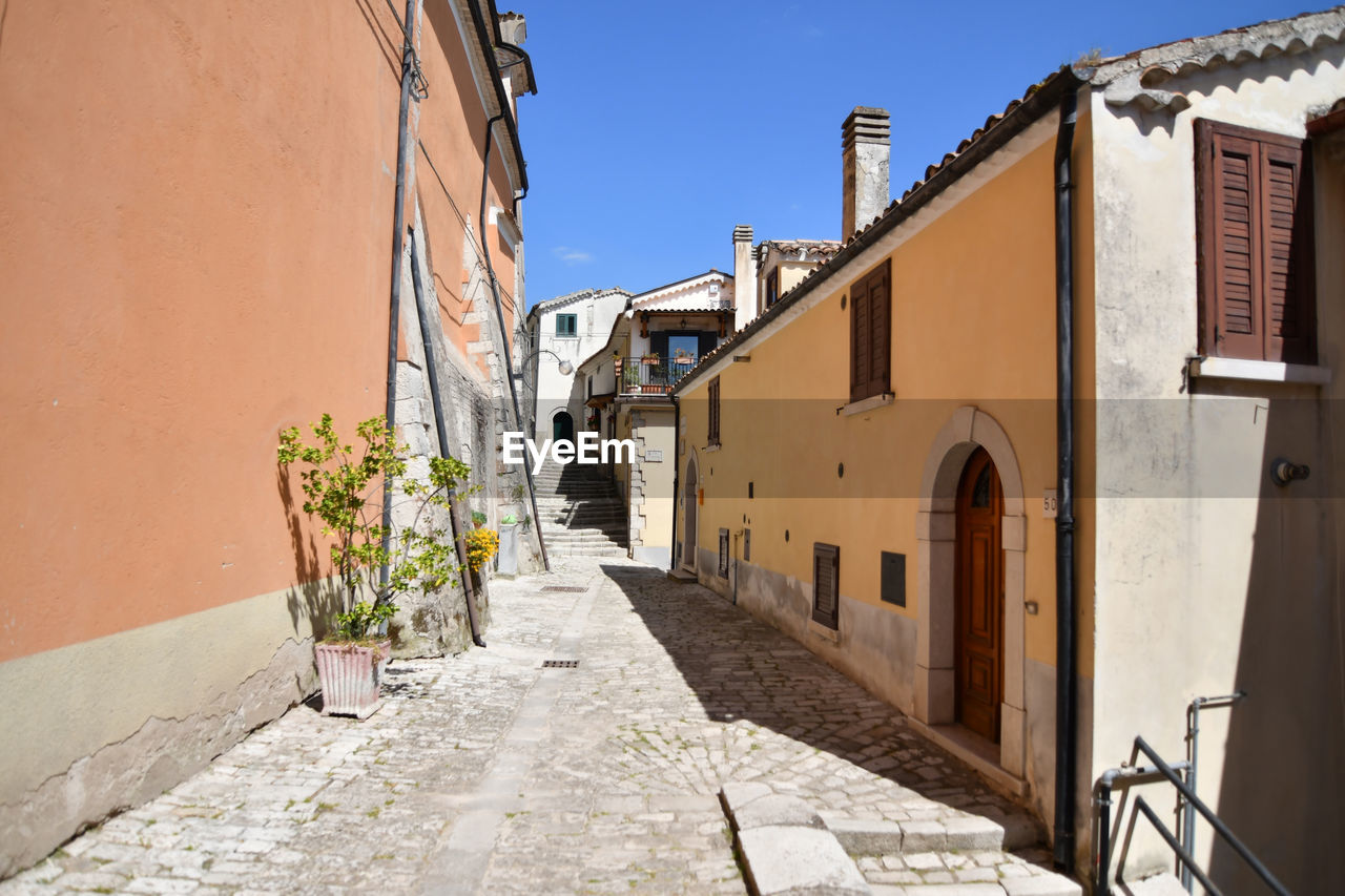 A narrow street of morcone, a medieval village in benevento province, italy.