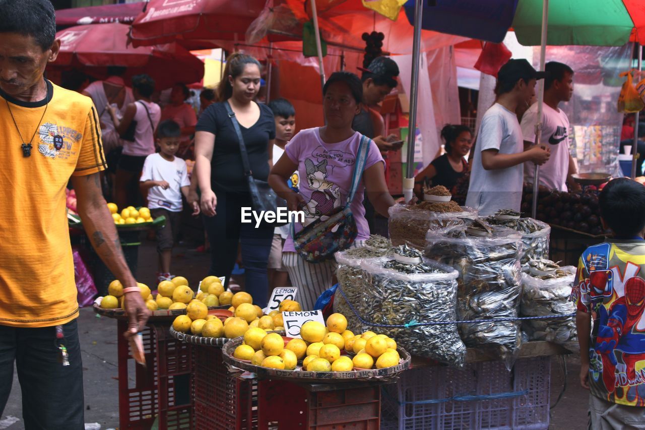 VARIOUS FRUITS FOR SALE AT MARKET