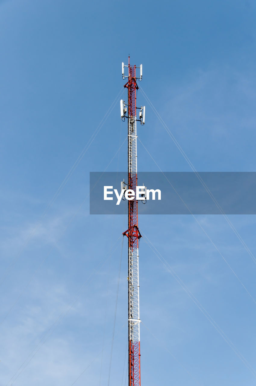 Communication tower against sky