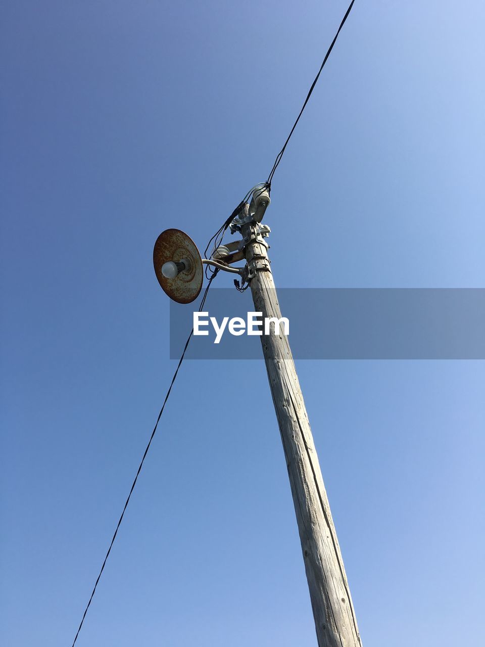 LOW ANGLE VIEW OF STREET LIGHT AGAINST SKY