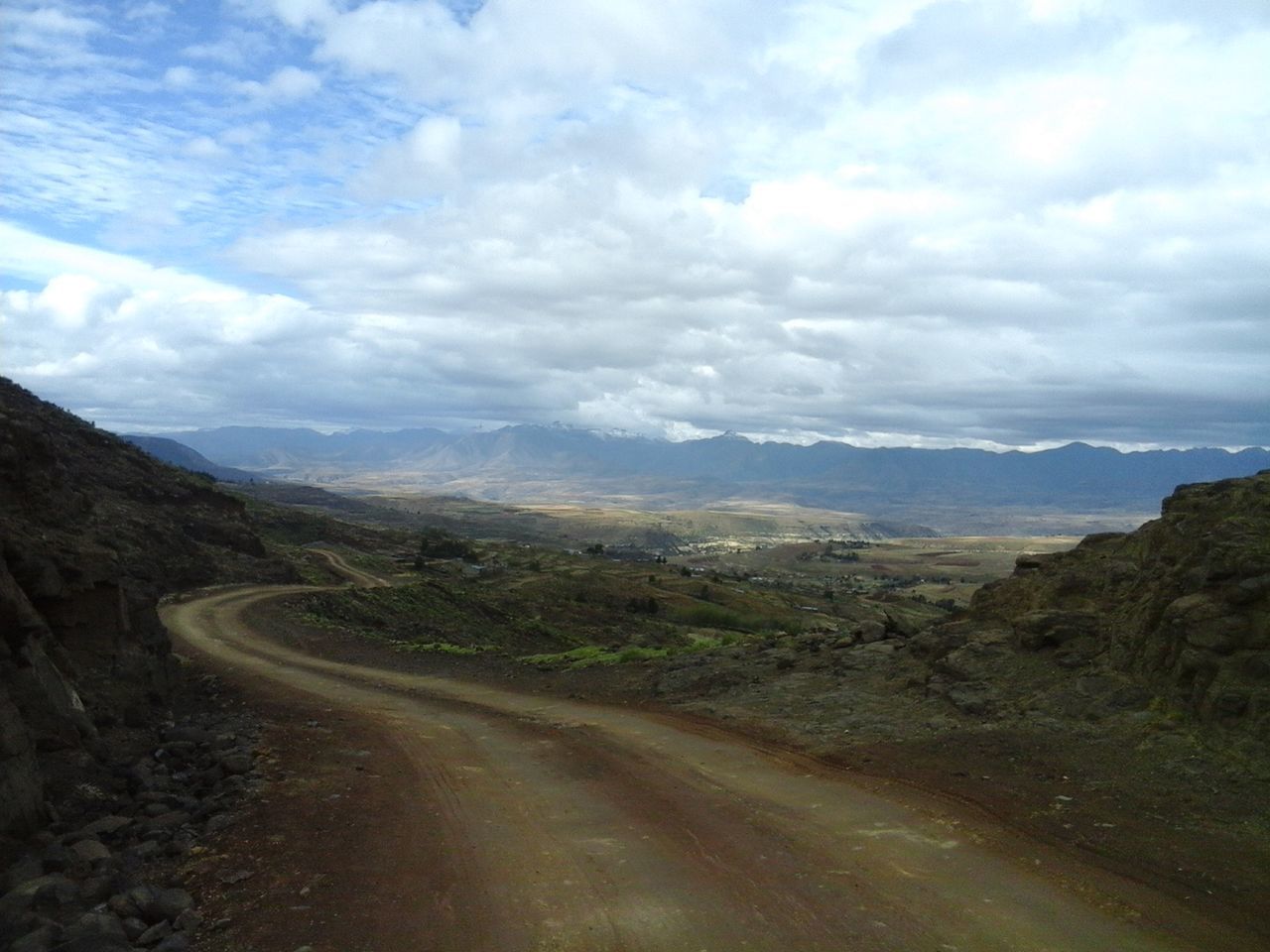 ROAD PASSING THROUGH MOUNTAINS