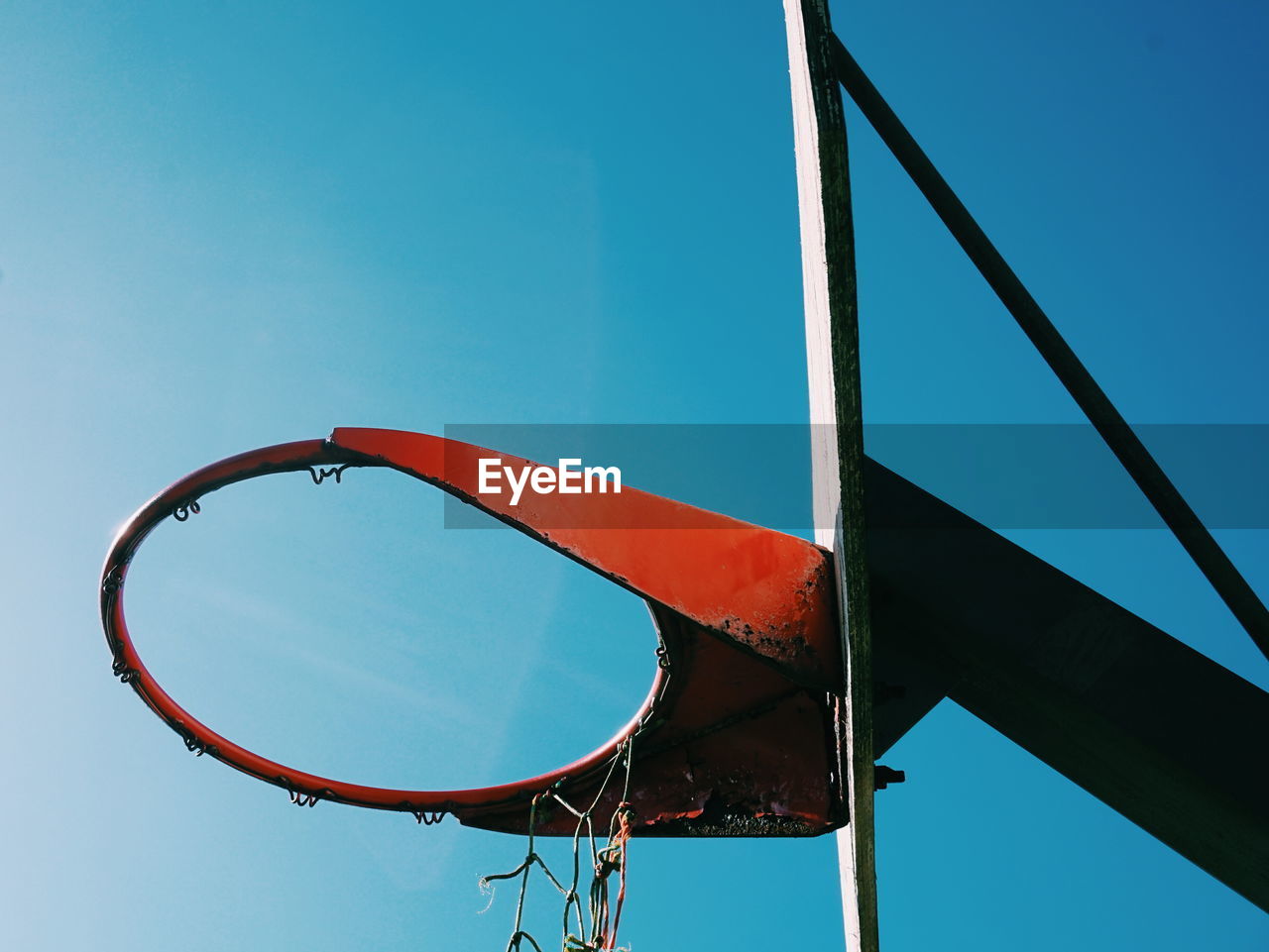 Low angle view of basketball hoop against sky