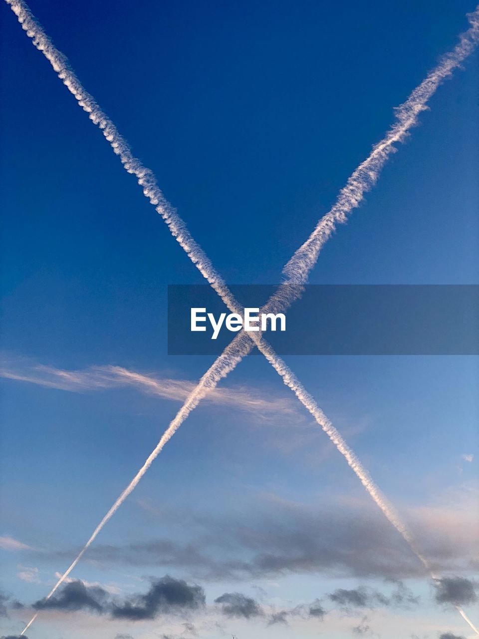 Low angle view of vapor trail in sky