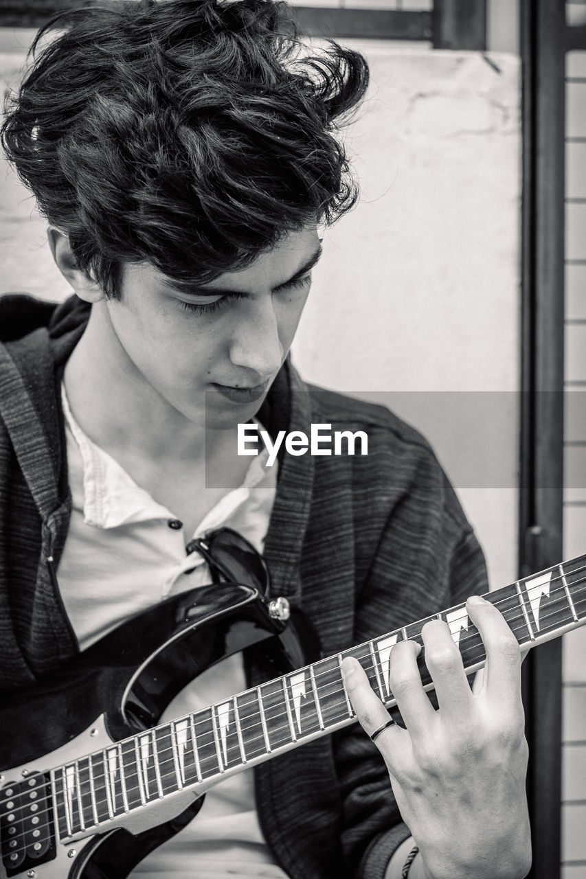 Young man playing guitar