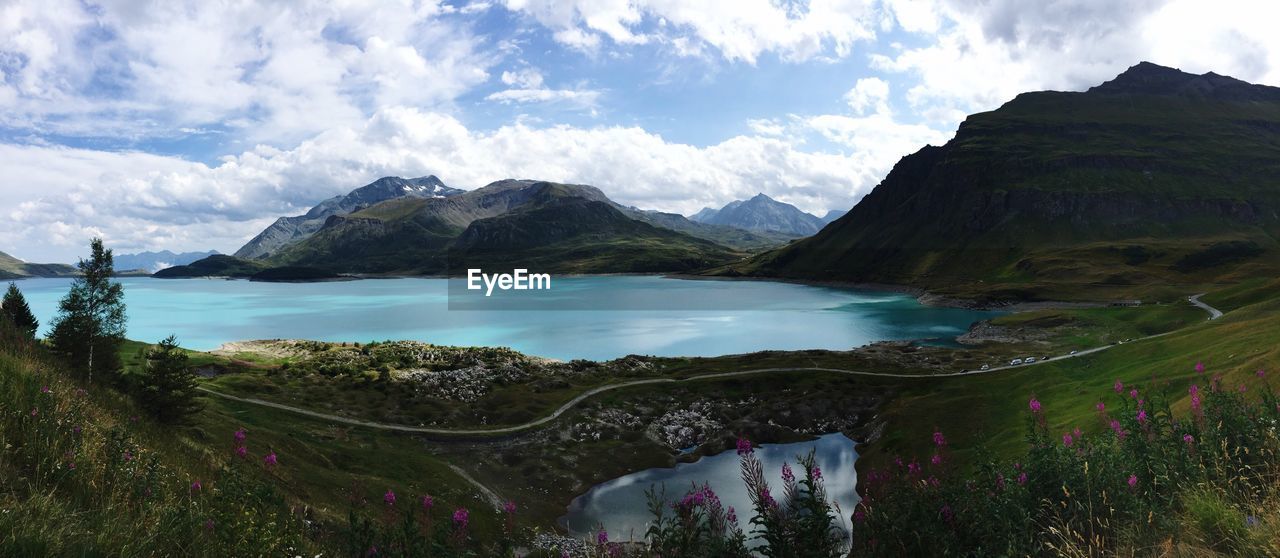 SCENIC VIEW OF LAKE AND MOUNTAINS