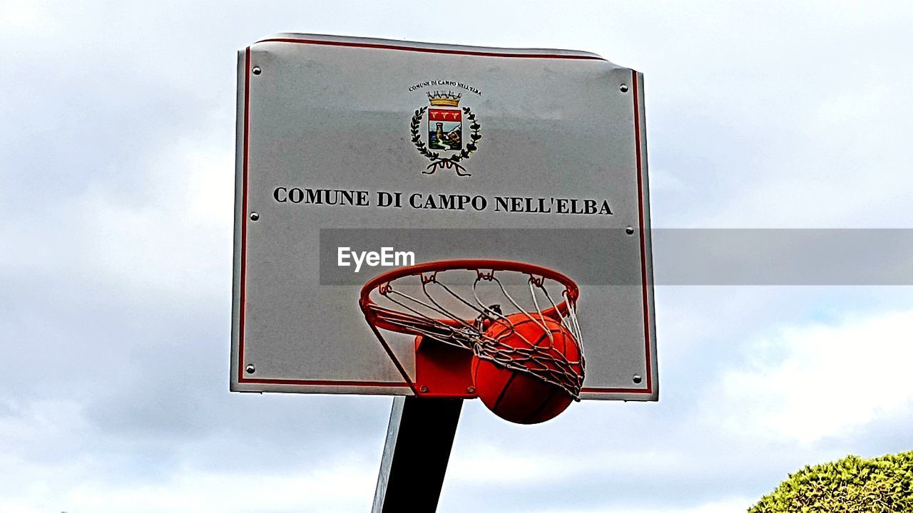 LOW ANGLE VIEW OF BASKETBALL HOOP