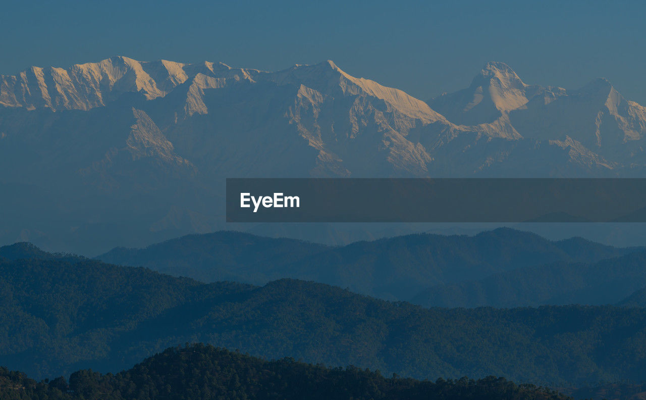 panoramic view of mountains against sky