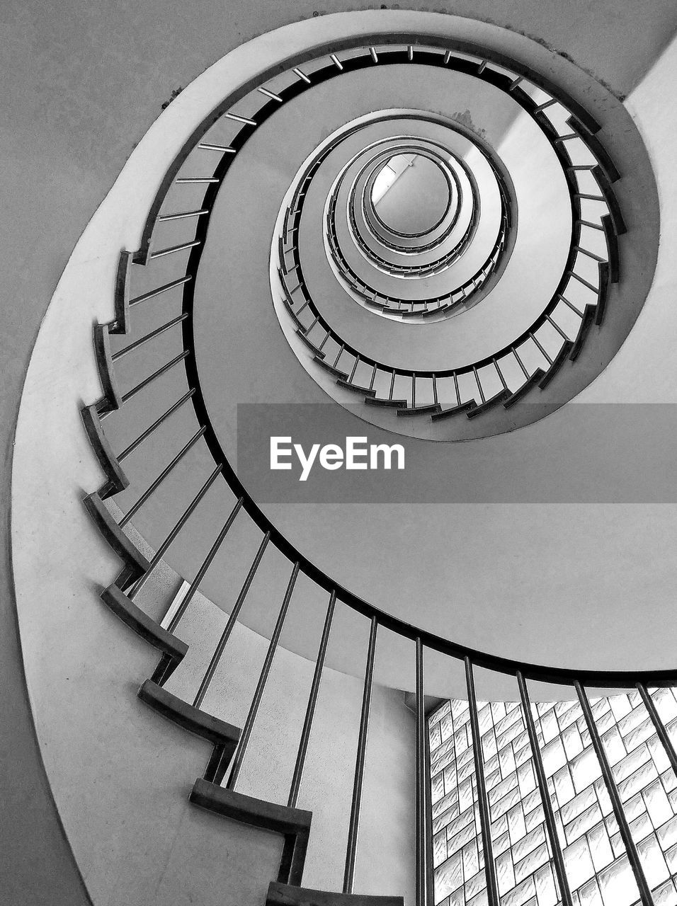 Low angle view of spiral staircase in building