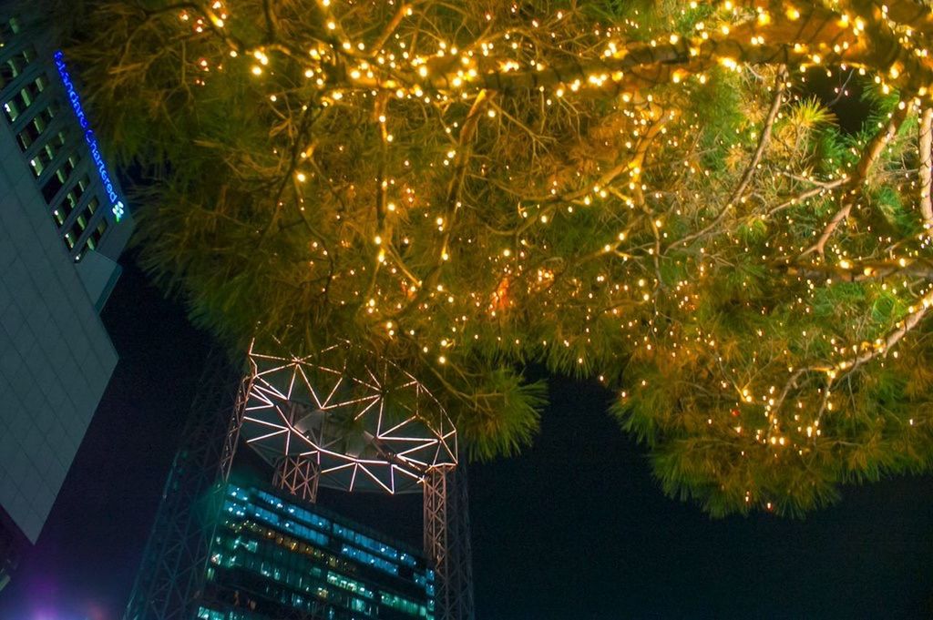 VIEW OF ILLUMINATED BUILDING AT NIGHT