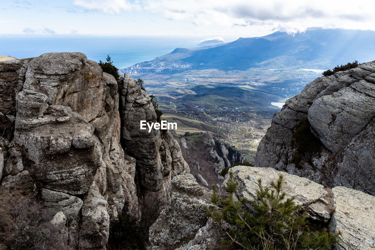 SCENIC VIEW OF MOUNTAIN AGAINST SKY