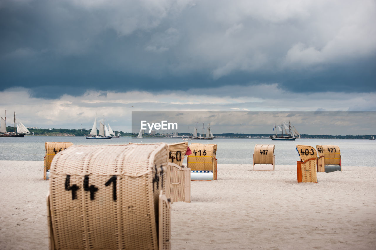 HOODED CHAIRS ON BEACH