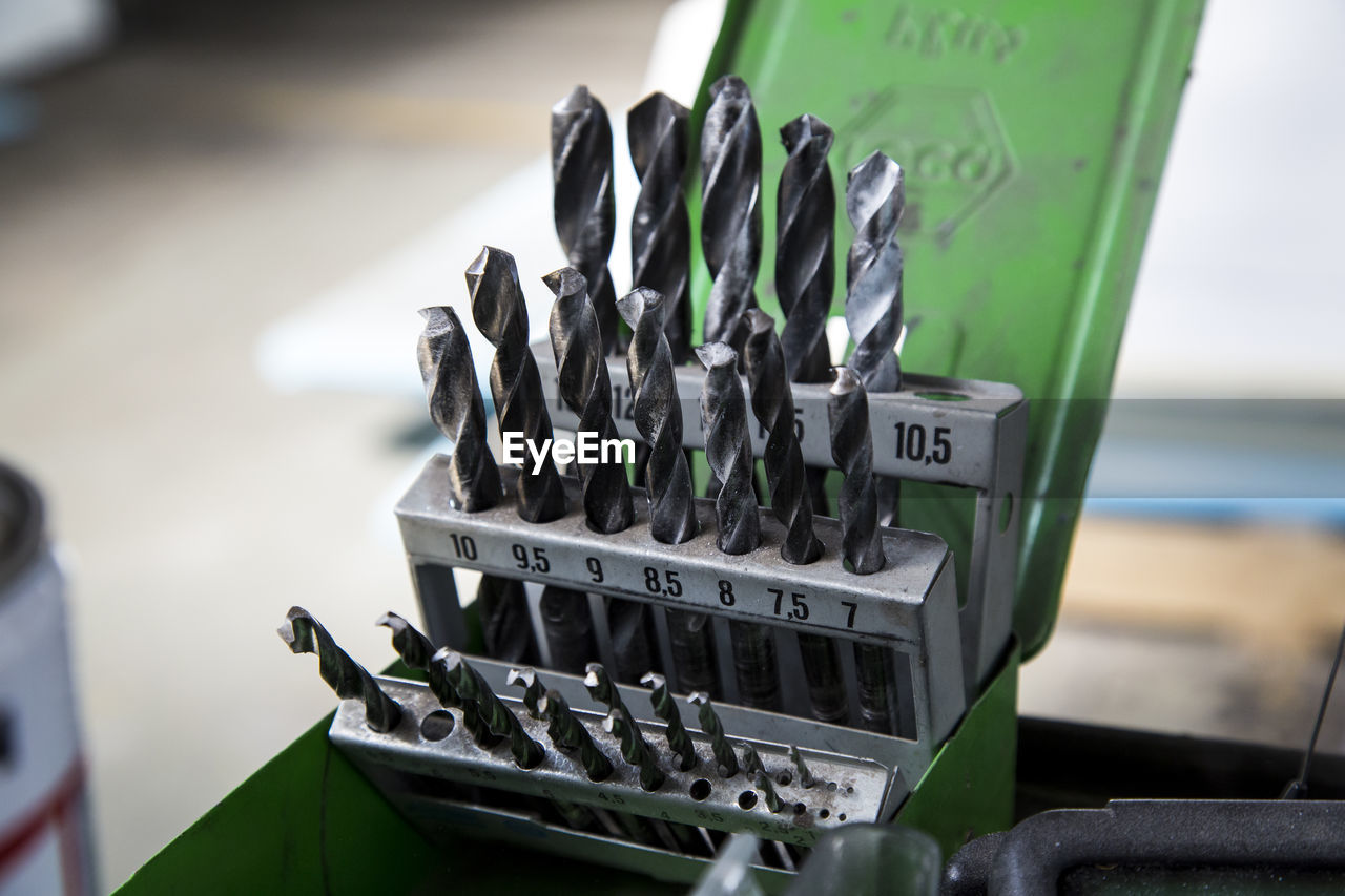 Close-up of drill bits in toolbox