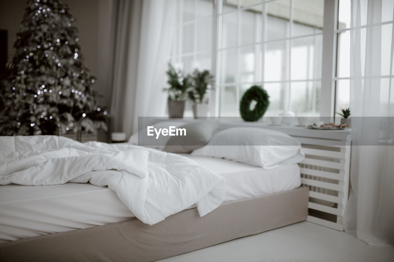 Man relaxing on bed at home